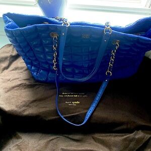 Kate Spade tote. Quilted bright blue w/ brass details.